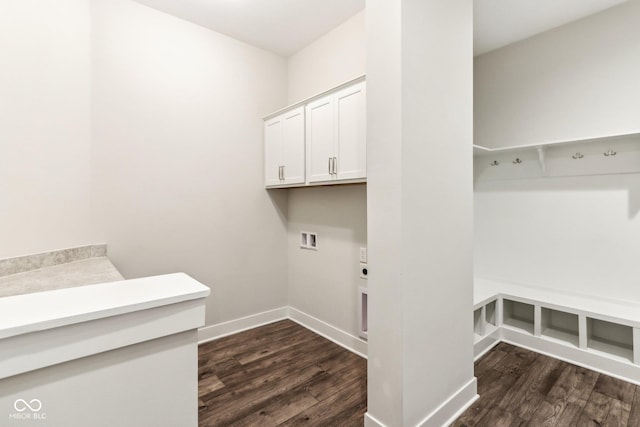 laundry area featuring cabinets, hookup for an electric dryer, hookup for a washing machine, and dark hardwood / wood-style floors