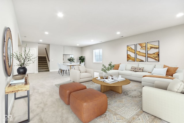 living room featuring light colored carpet