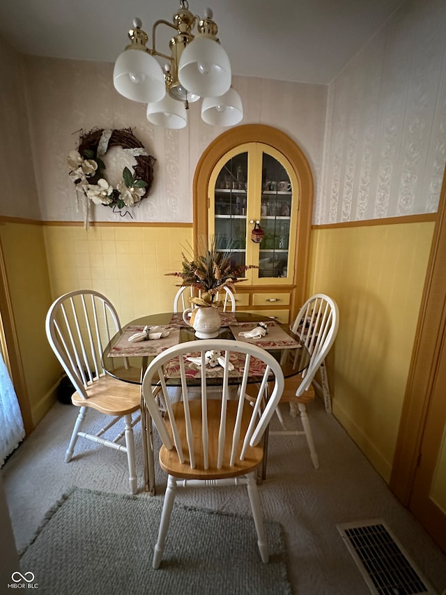 view of carpeted dining space