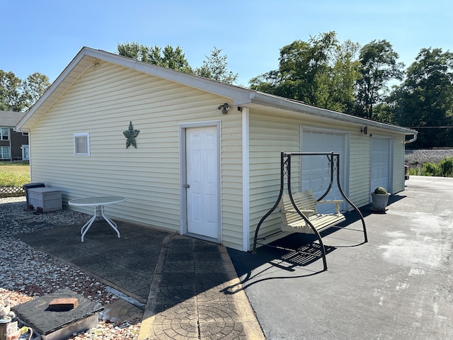 exterior space with a garage