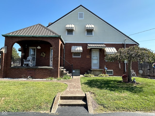 view of front facade with a front yard