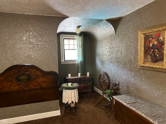 bedroom featuring a textured ceiling