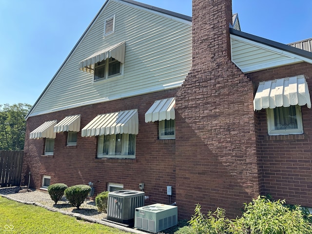 view of home's exterior featuring central AC unit