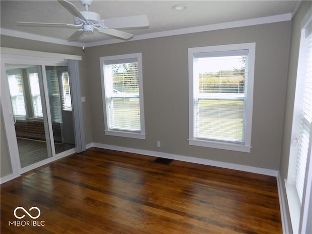 unfurnished bedroom featuring ceiling fan, multiple windows, and dark hardwood / wood-style flooring