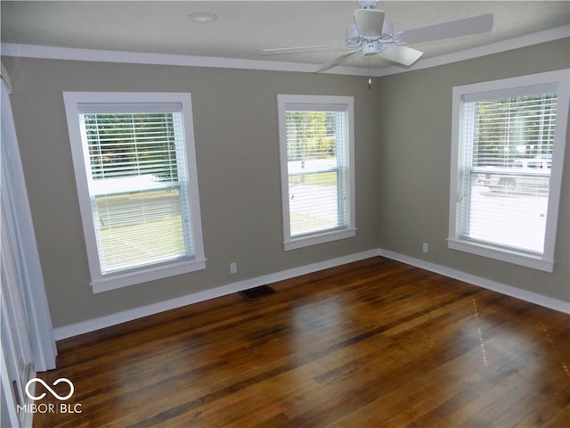 spare room featuring ceiling fan and dark hardwood / wood-style flooring