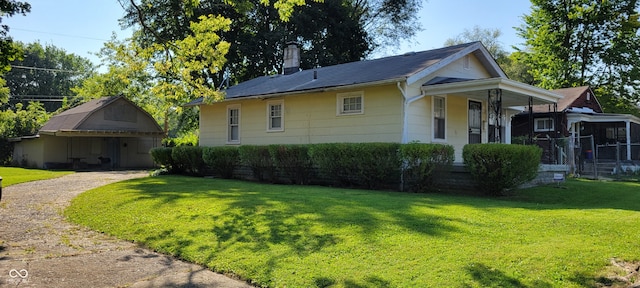 view of property exterior featuring a yard