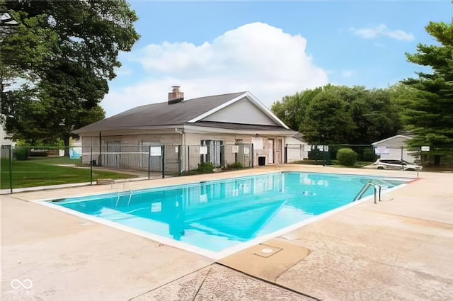 view of pool featuring a patio area