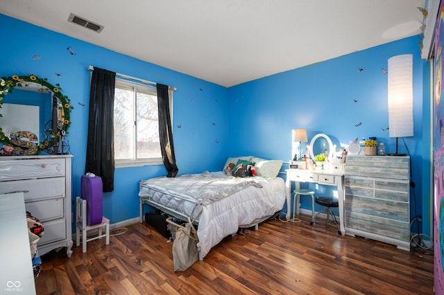 bedroom featuring dark wood-type flooring