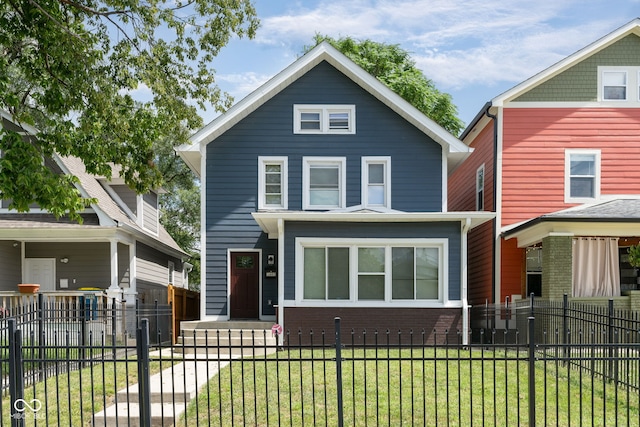 front facade featuring a front yard