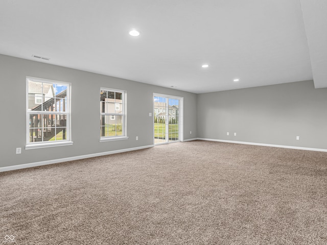 view of carpeted spare room