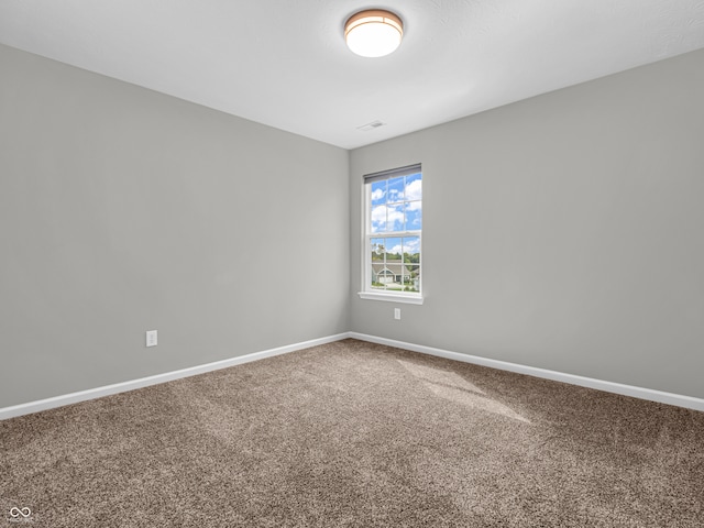 empty room featuring carpet