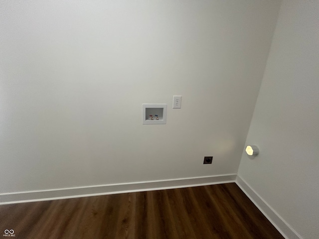 washroom featuring hookup for a washing machine, electric dryer hookup, and dark hardwood / wood-style floors