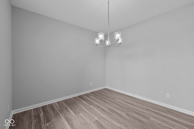 unfurnished room featuring hardwood / wood-style floors