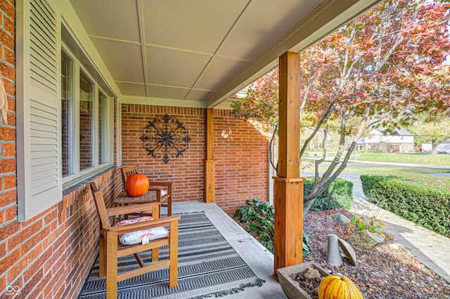 view of patio featuring covered porch