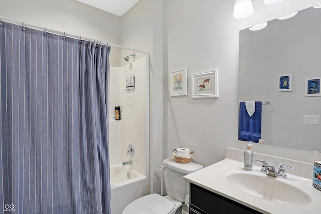 bathroom with toilet, shower / bath combo, and vanity