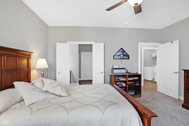 carpeted bedroom featuring ceiling fan and washing machine and clothes dryer