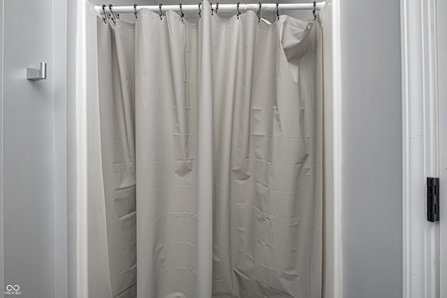 7587 Shady Side Dr, Bloomington, IN 47401 - bathroom featuring a shower with curtain