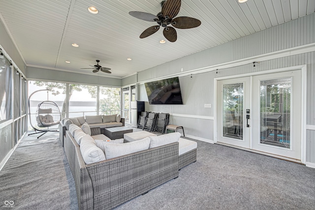 sunroom with ceiling fan and french doors