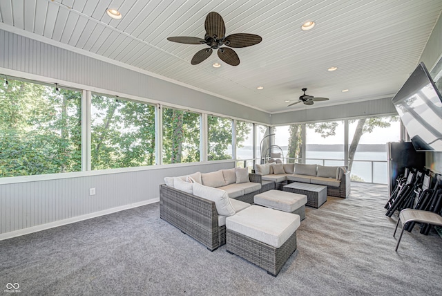 exterior space featuring ceiling fan