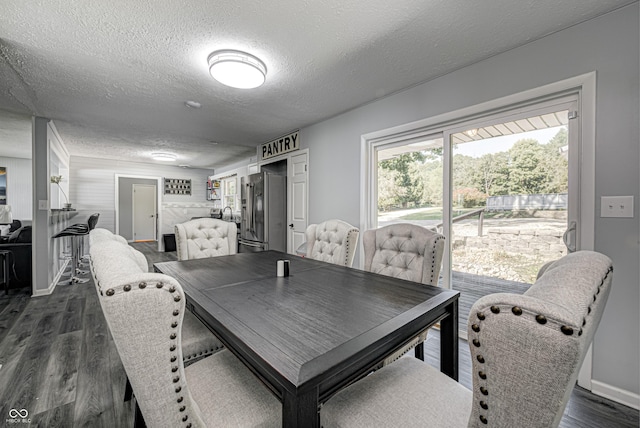 7587 Shady Side Dr, Bloomington, IN 47401 - dining area with baseboards, dark wood-type flooring, and a textured ceiling