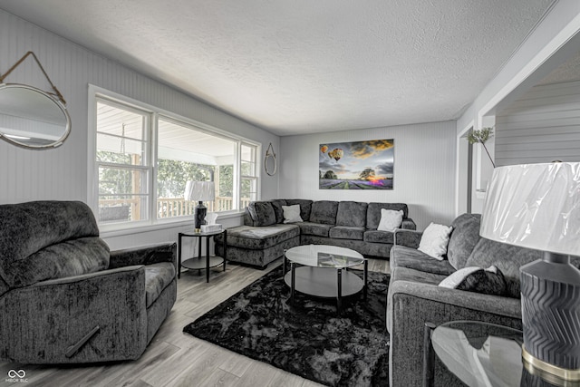 7587 Shady Side Dr, Bloomington, IN 47401 - living room with a textured ceiling and wood finished floors