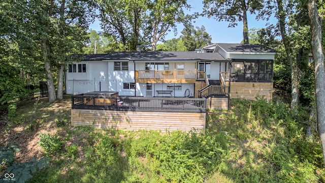 7587 Shady Side Dr, Bloomington, IN 47401 - back of property featuring a chimney, a wooden deck, a sunroom, and stairway