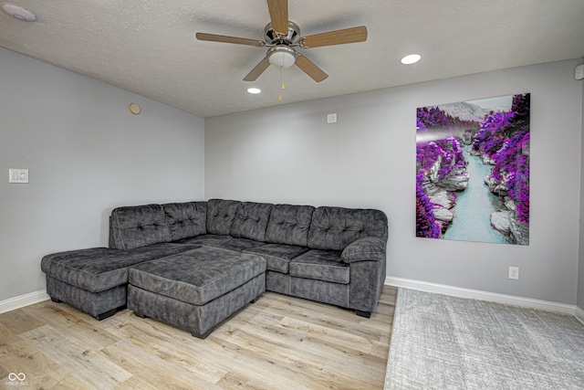 7587 Shady Side Dr, Bloomington, IN 47401 - living room with baseboards, wood finished floors, recessed lighting, and a ceiling fan
