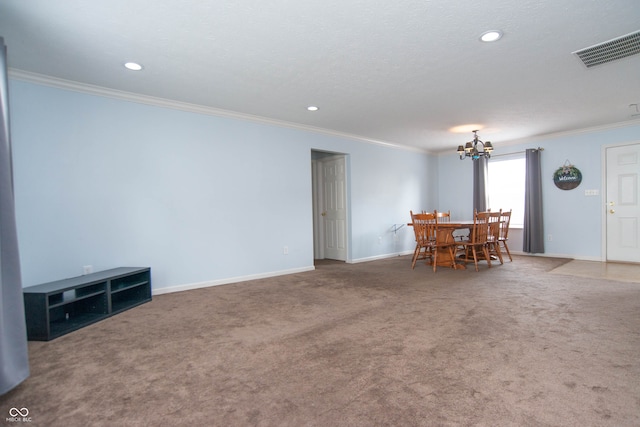 interior space featuring carpet flooring, an inviting chandelier, and crown molding