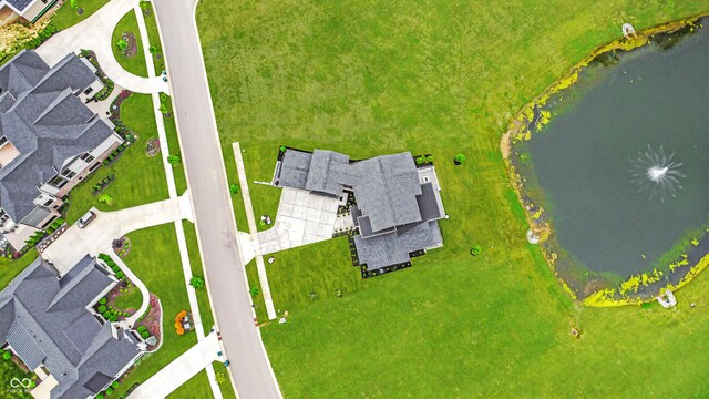 drone / aerial view featuring a water view