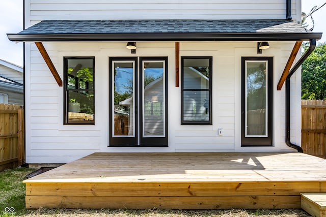 property entrance with a deck