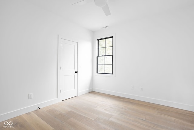 unfurnished room with ceiling fan and light hardwood / wood-style floors