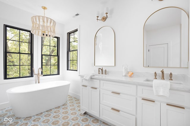 bathroom featuring vanity and a bathtub