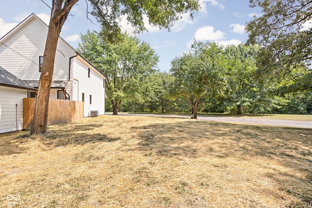 view of yard with central air condition unit