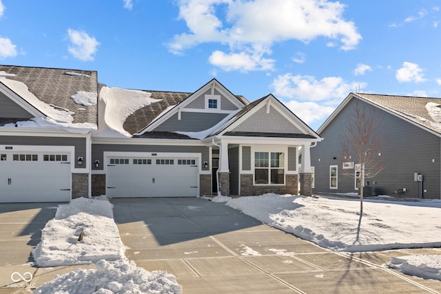 craftsman house with a garage