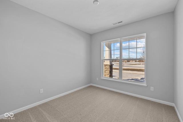 view of carpeted spare room