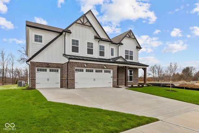 view of front of property featuring central AC, a front lawn, and a garage