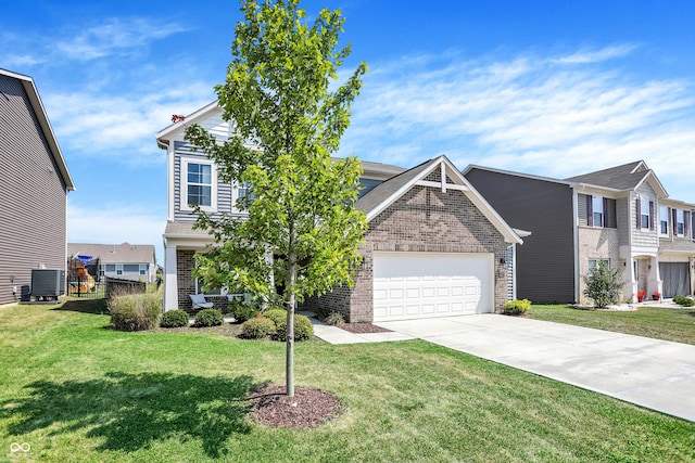 view of front of home with a front lawn, a garage, and central AC unit