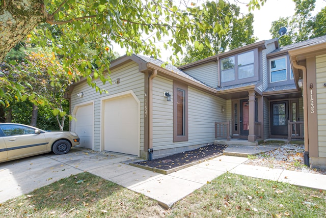 view of side of home with a garage