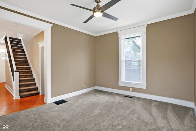 unfurnished room with ceiling fan, hardwood / wood-style flooring, and crown molding