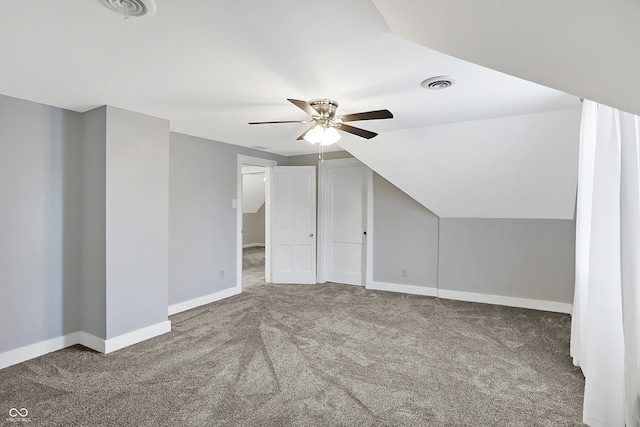 bonus room featuring vaulted ceiling, ceiling fan, and carpet