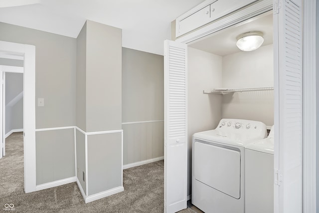 laundry room featuring washer and clothes dryer and carpet floors