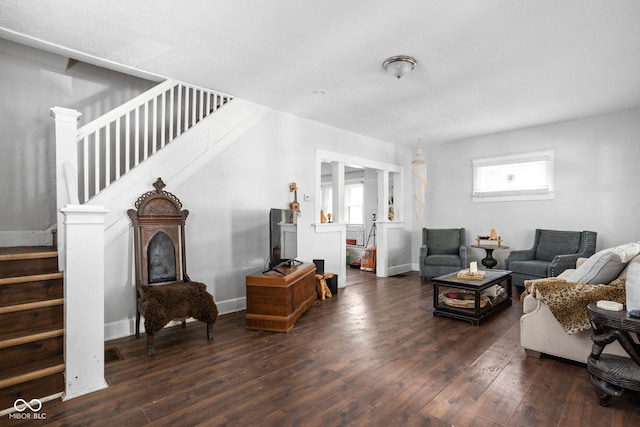 living room with dark hardwood / wood-style floors