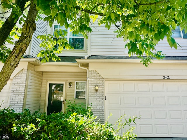 exterior space with a garage