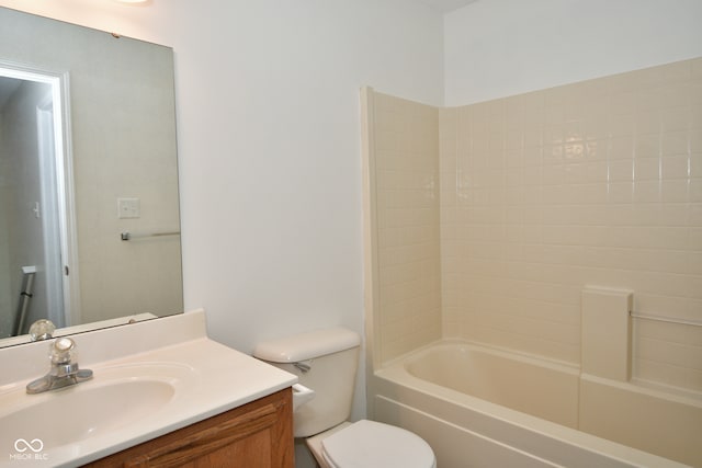 full bathroom featuring vanity, toilet, and washtub / shower combination