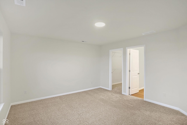 view of carpeted spare room