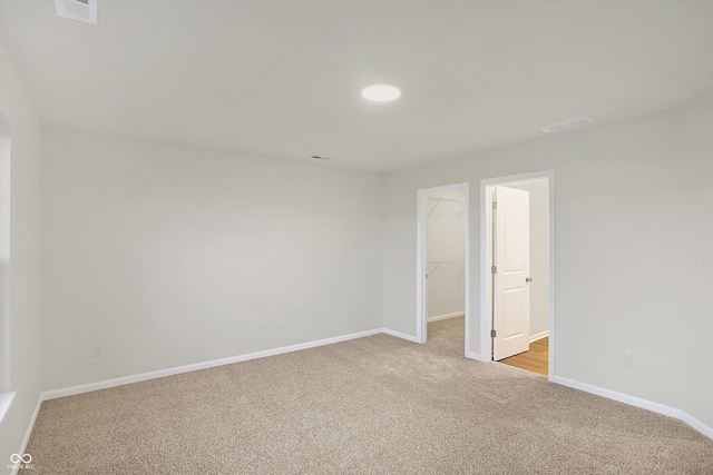 134 Maxim Ct, Cumberland, IN 46229 - empty room with light colored carpet and baseboards
