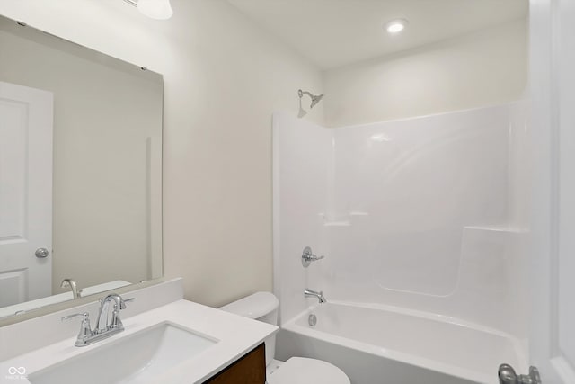 full bathroom with vanity, toilet, and shower / tub combination