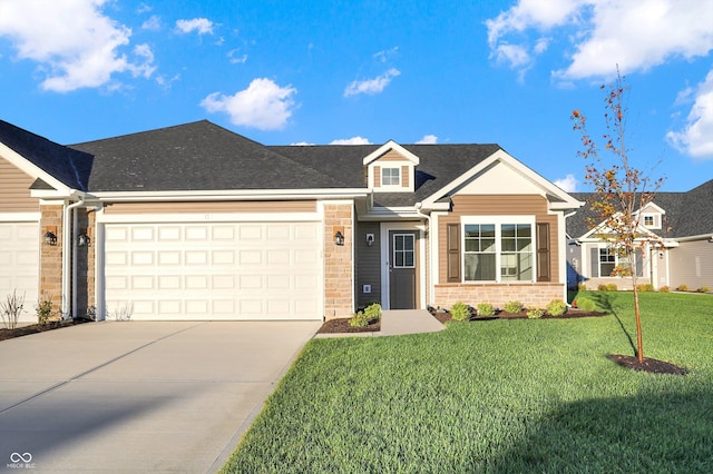 134 Maxim Ct, Cumberland, IN 46229 - view of front of property with driveway, a front yard, and a garage