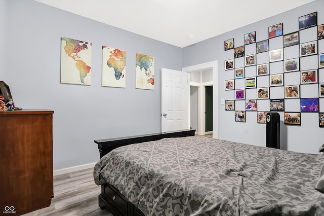 bedroom featuring hardwood / wood-style floors