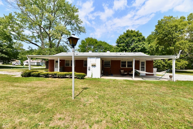 ranch-style home with a front yard